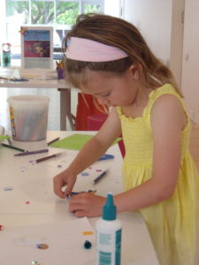 Charli making a brooch